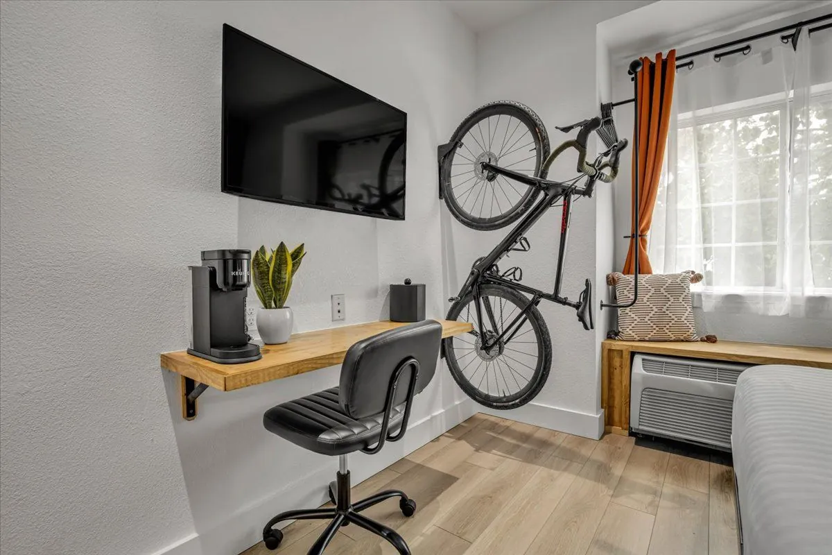 Wall-mounted in-room bike storage rack