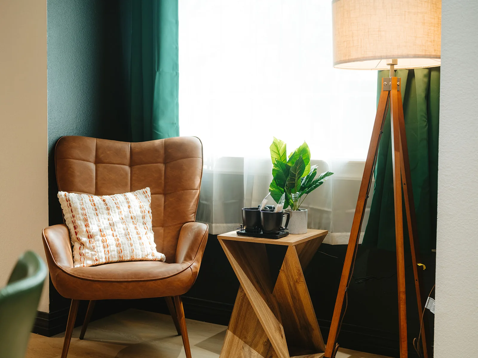 Cozy leather reading nook chair in The Vibe Lounge
